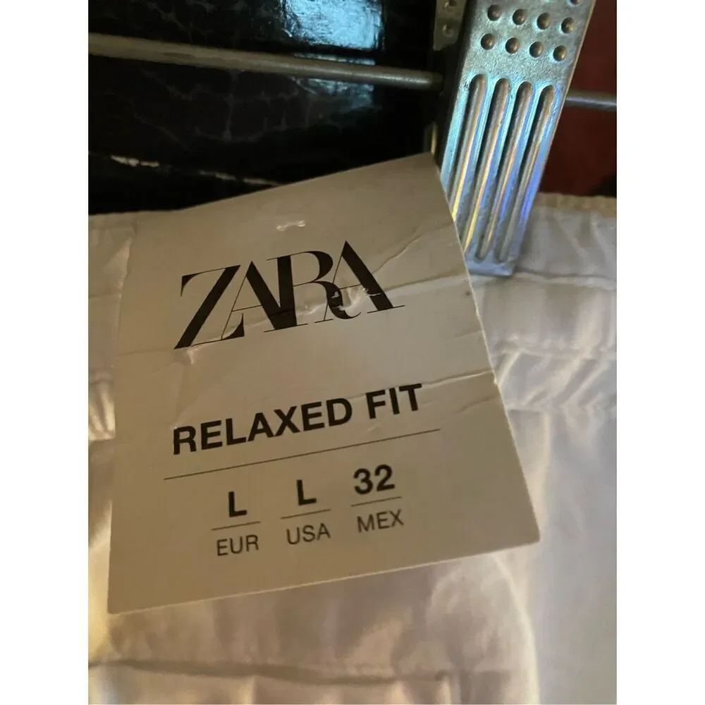 Zara NWT, women’s white relaxed, fit pants size large